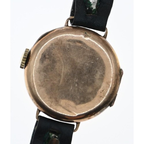 42 - 9ct gold cased ladies wristwatch with enamel face, dia. 26mm, on leather strap, gross weight 17.3 gr... 