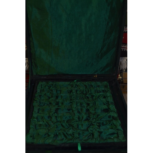 493 - Onyx chess board 41x41cm and chess pieces in a velvet purpose made case.