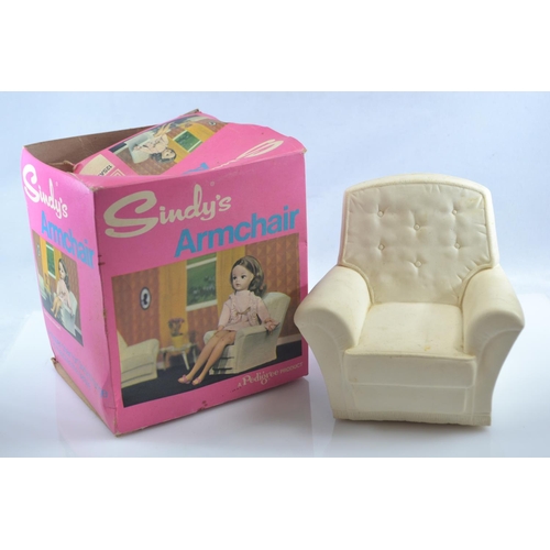 506 - Five boxed Sindy Pedigree furniture sets together with a large quantity of vintage doll clothes (mos... 