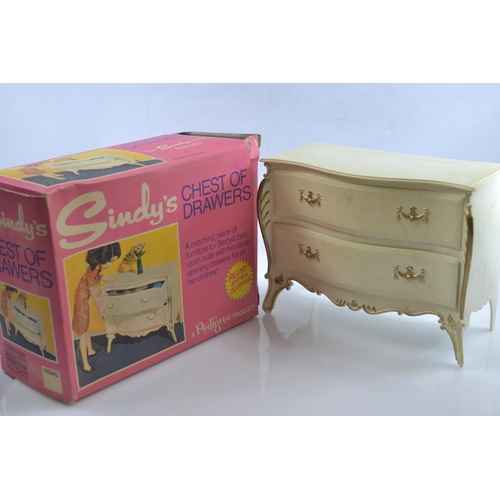 506 - Five boxed Sindy Pedigree furniture sets together with a large quantity of vintage doll clothes (mos... 