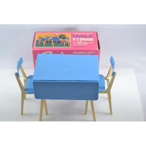 506 - Five boxed Sindy Pedigree furniture sets together with a large quantity of vintage doll clothes (mos... 