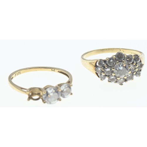 107 - Three 9ct gold rings set with CZ, sizes K-M, gross weight 5.21 grams, one stone missing