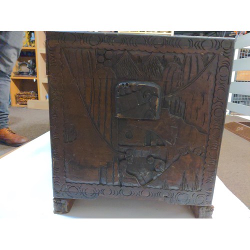 417 - Camphor wood heavily carved trunk 'Victoria Brand', made in Hong Kong. W110 x D53 x H57cm