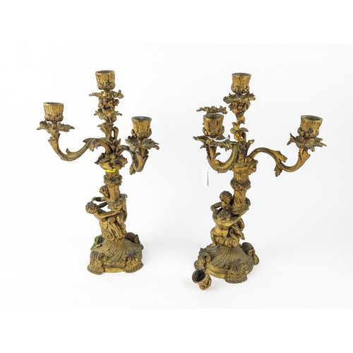 445 - Pair of gilt metal figural candelabra, height 38cm approx