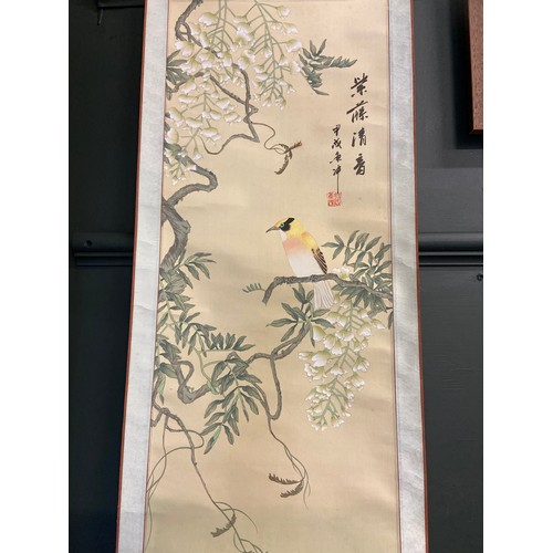 421A - Chinese silk art work on hanging scroll of native tree and bird with red stamp to top right alongsid... 