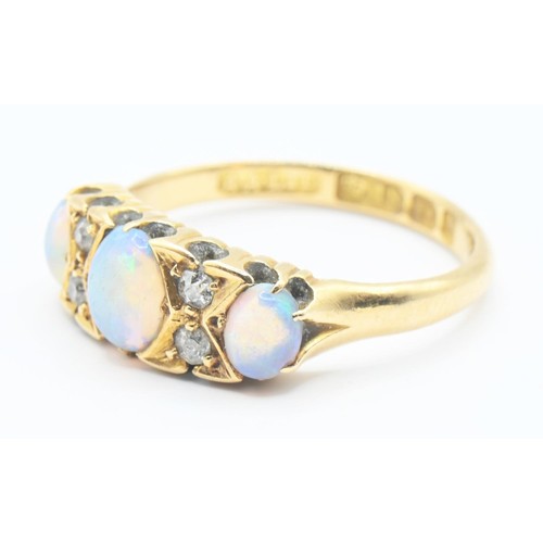 111 - 18ct gold, opal and diamond ring. Size N, gross weight 3.4g