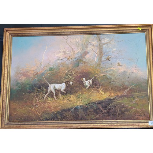 421 - J.Kingman (C20th), oil on canvas of two pointers raising game amongst woodland, signed lower right, ... 