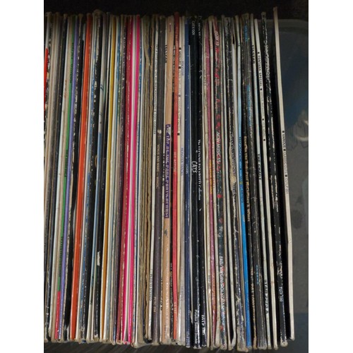 148 - Two clear plastic containers full of long playing vinyl records inc, Mike Oldfield, Tomita, John Han... 