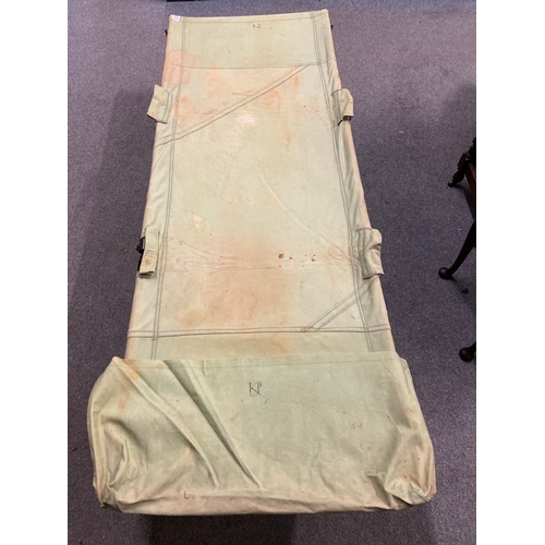 165 - Military officers canvas, metal and wood folding bed. Has original bag with written details of origi... 