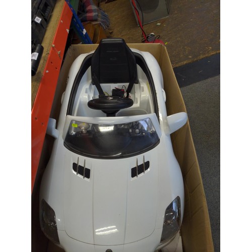 163 - Childs electric ride on Mercedes sports car in white with battery and charger.