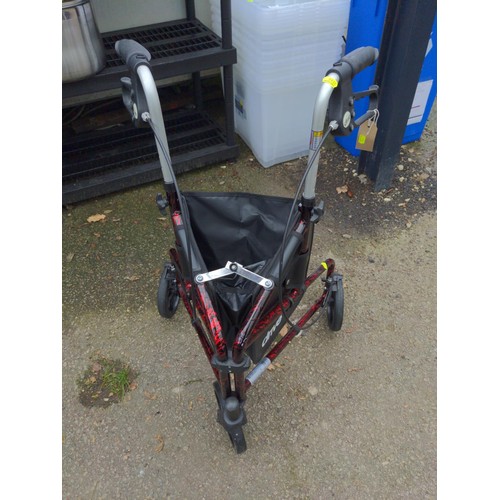 254 - Drive folding mobility walker with storage area.