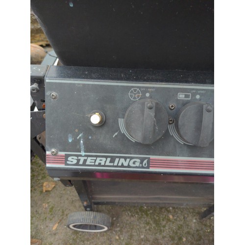 374 - Gas BBQ Sterling with gas bottle and side burner.