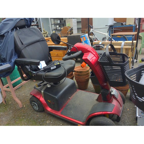 376 - Pride Colt deluxe ride on electric mobility scooter. With charger, key and protective cover.