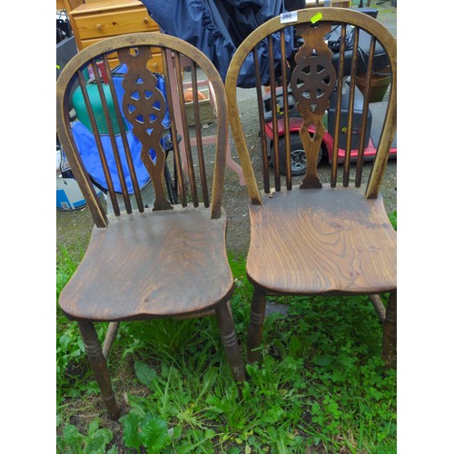 380 - Two elm wheel back kitchen chairs. 