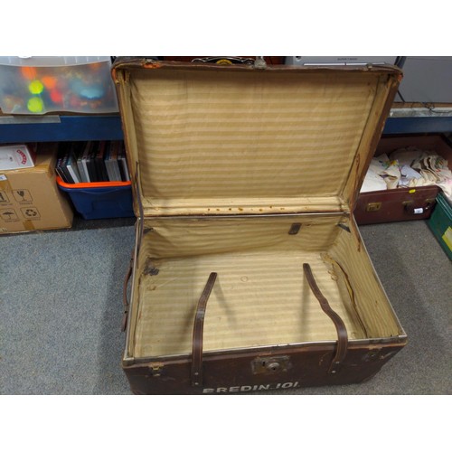 78 - Large leather strapped travel trunk with C. Drew, Bredin 101 printed to top and front.