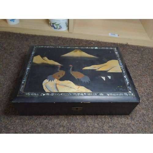 708 - Laquered black wood musical jewellery box painted to top with mountain and birds and inlaid with MOP... 