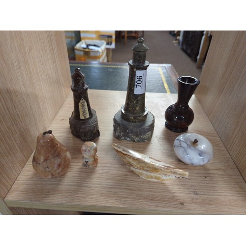 706 - Seven pieces of mixed stone ware, Inc, Serpentine light house and one with a thermometer. Tall 17cm