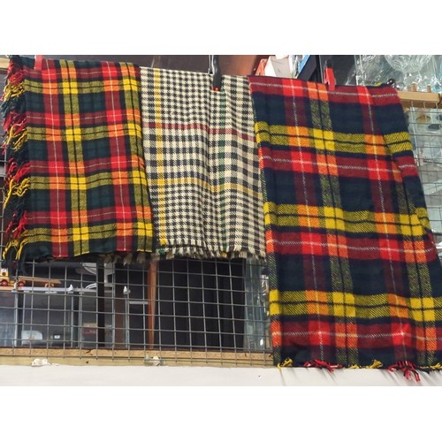 931 - Three tartan blankets 100% wool on one label, all three have different colour base.