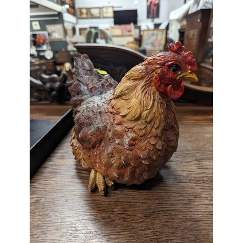 309A - Resin chicken together with a wall hanging hedgehog bracket and squirrel bell