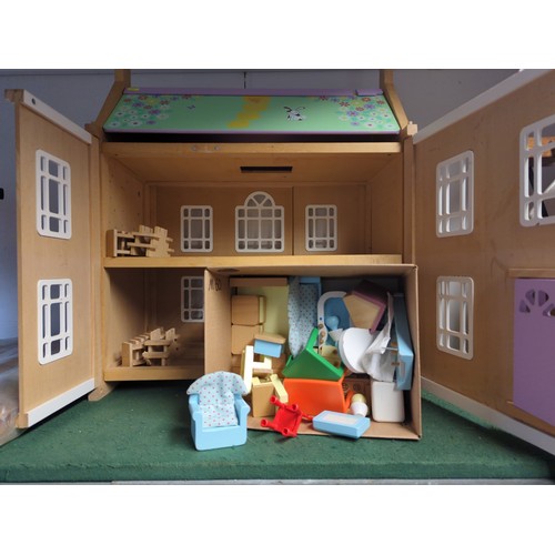 198 - Modern style dolls house by Tidlo with two storey set up and front/back windows/doors. Includes box ... 