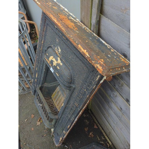 71 - Vintage cast iron fire place with grate