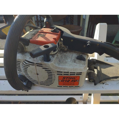 112 - Stihl 012 AV electronic quick stop petrol chainsaw.