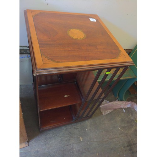 131 - Edwardian style inlaid mahogany revolving book case. W49.5cm x D49.5cm x H80cm