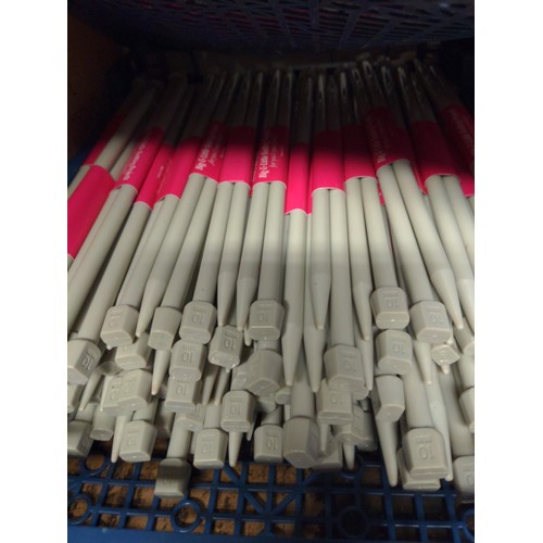 235 - 2 trays of 10mm plastic Knitting needles & a tray of shorter 4mm needles