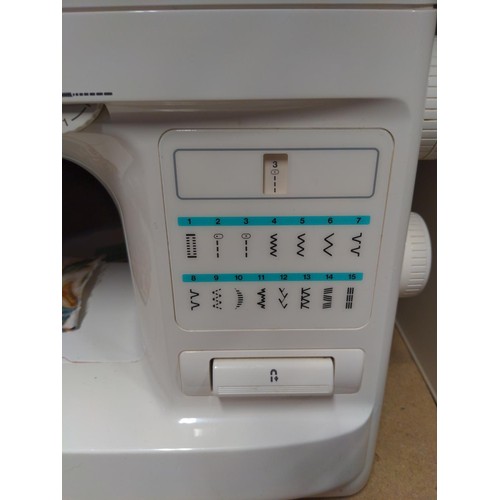 295 - Brother Celebrity 15 sewing machine with manual & attachments