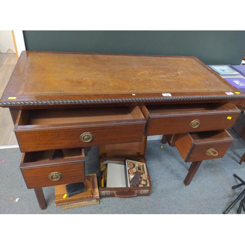 476 - Leather topped 4 drawer writing desk with twist to edges W107cm D51m H78cm