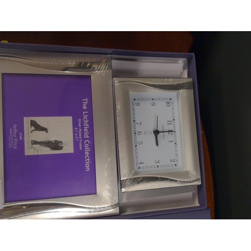 478 - Silver plated picture frame & clock, as new in box