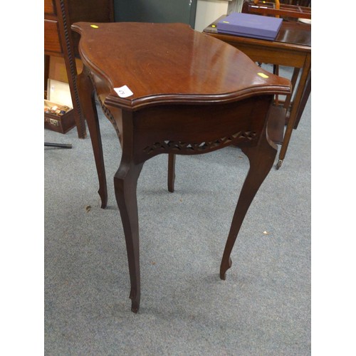 479 - Mahogany side table with fretworked apron. W57cm D38cm H70cm