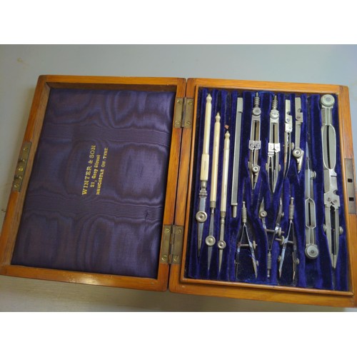 517 - Cased Winter & Son draughtsman's drawing set together with brass balance scales