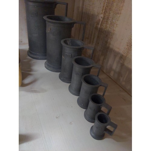 527 - 5 graduated Pelperto pewter measures with Coates Somerset cider cups