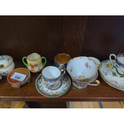 530 - Shelf of small ceramics inc. teacups, saucers & cock