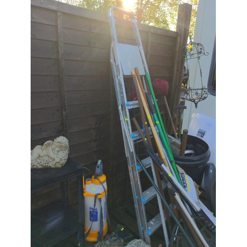 62 - Step ladder 6 steps, selection of long handled tools, garden obilisk, Karcher window extension poles... 