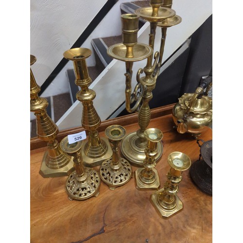 526 - Collection of brass candlesticks, kettle and a dark metal Indian style twin handles vessel. Tallest ... 