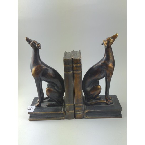 359 - Resin bookends in the form of bronzed greyhounds sitting on books, height 23cm. One bookend with sma... 