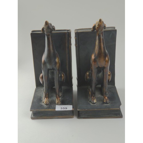 359 - Resin bookends in the form of bronzed greyhounds sitting on books, height 23cm. One bookend with sma... 