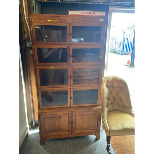 891 - Art Deco style stacking x 4 bookshelves with two door cupboard to base. W89 D29 H174 cm