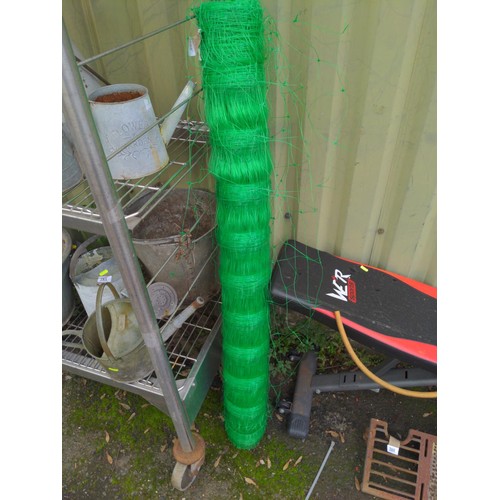 84 - Roll of green garden netting.