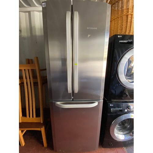 98 - Large Hotpoint Airtech evolution fridge freezer W70D72H195cm approximately.