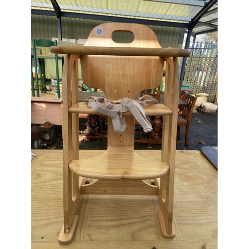 100 - Modern child’s beechwood high chair. H86cm. Very clean condition.