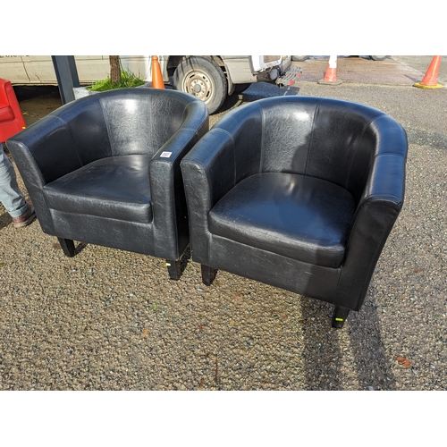 120 - Pair of black leather effect tub chairs