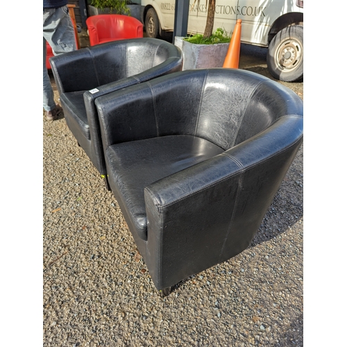 120 - Pair of black leather effect tub chairs