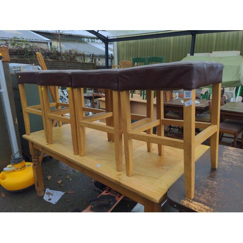 10 - Four leather effect bar stools. W44D45H66cm