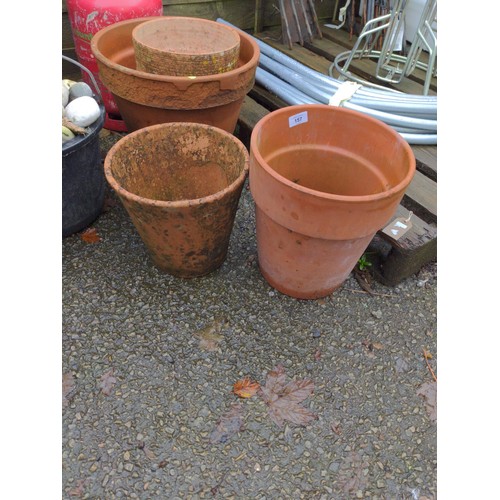 157 - Five terracotta garden pots in various sizes, largest dia 37cm, H32cm