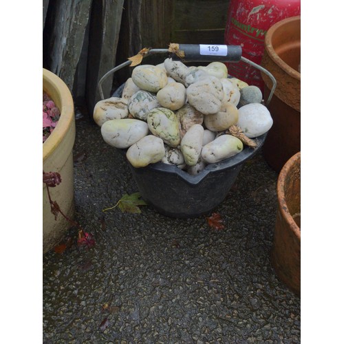159 - Bucket full of ornamental pebbles.
