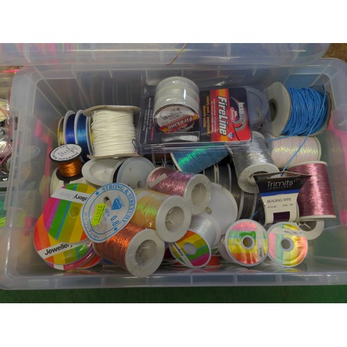 167 - One large plastic box and two small with jewellery making, leather straps, cords, elastic, wire etc.