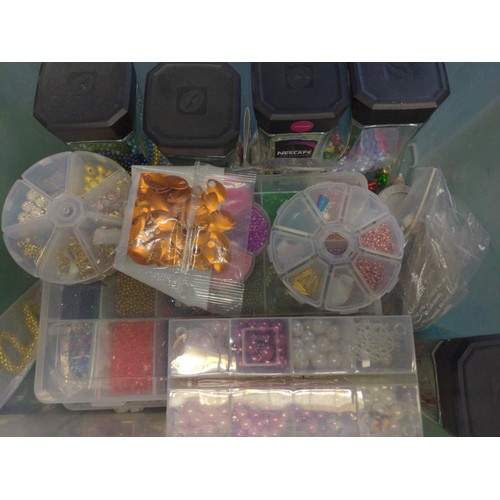 168 - Plastic container with jewelry making beads, fastenings, pendant etc.., 